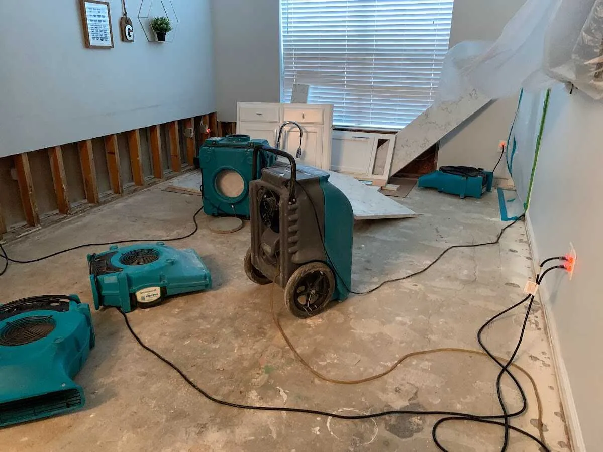 Dehumidifier in flood-cut room for Water Damage Restoration in Farmville